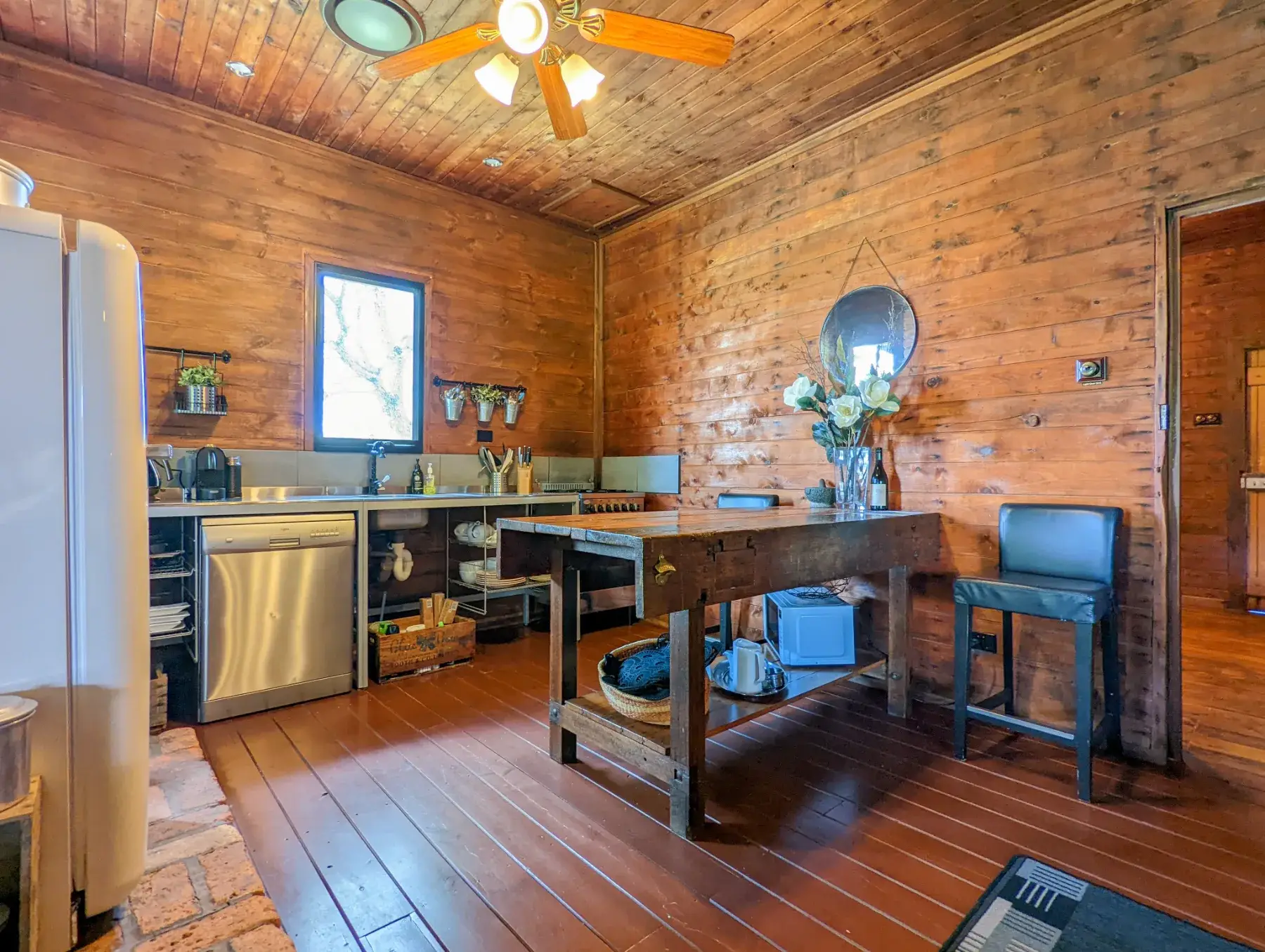 The Cottage kitchen, gas cooktop and a work table to gather round